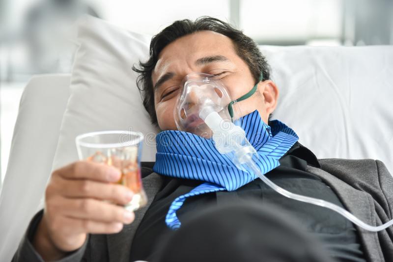 Cool dude on a ventilator drinking two fingers of whiskey